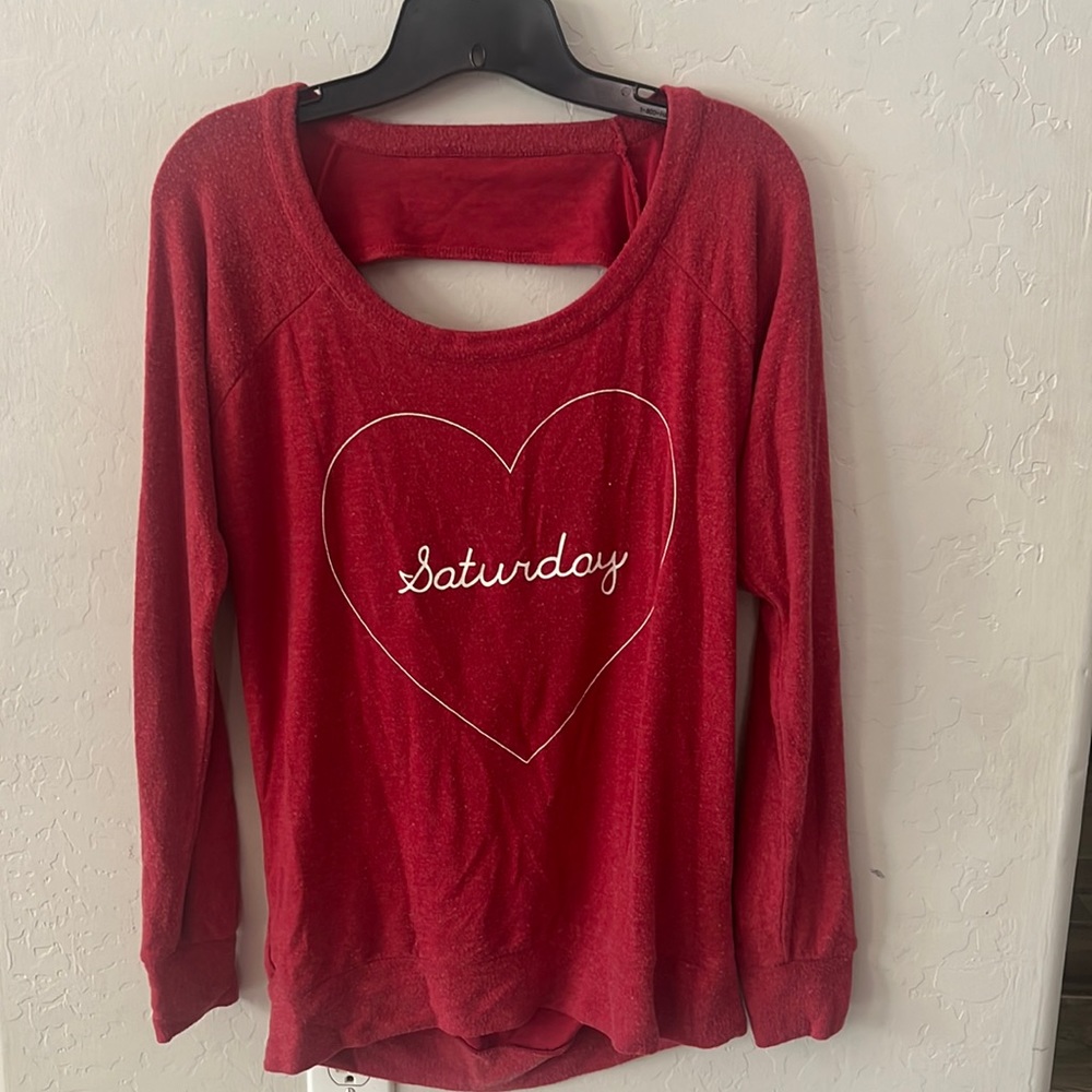 Women’s long sleeve super soft sweatshirt with open back detail.
